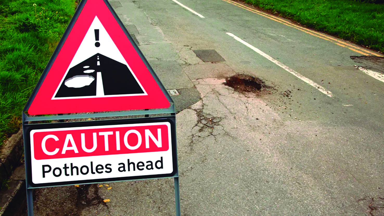 Potholes???  We don’t need no stinkin’ potholes!!